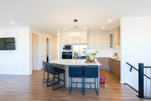 228 Windrow Link Sw, Airdrie, AB - Indoor Photo Showing Kitchen With Upgraded Kitchen