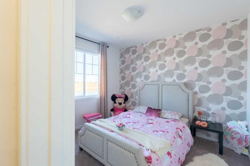228 Windrow Link Sw, Airdrie, AB - Indoor Photo Showing Bedroom