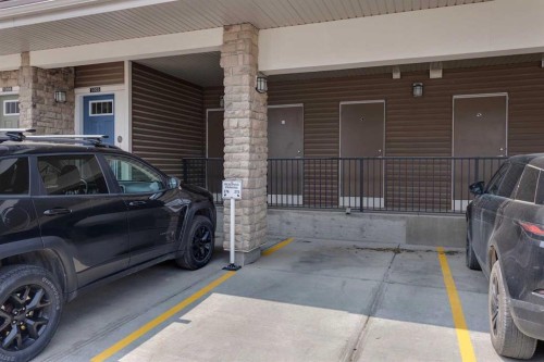 1009-250 Fireside View, Cochrane, AB - Indoor Photo Showing Garage