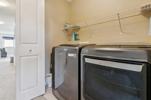 100 Sage Valley Drive Nw, Calgary, AB - Indoor Photo Showing Laundry Room