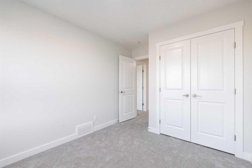 17 Sora Gardens Se, Calgary, AB - Indoor Photo Showing Other Room