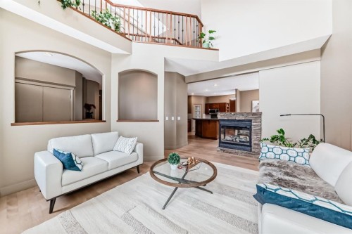 38 Discovery Ridge Green Sw, Calgary, AB - Indoor Photo Showing Living Room With Fireplace