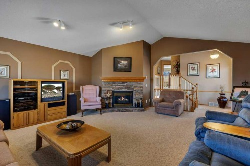 123 Valley Glen Bay Nw, Calgary, AB - Indoor Photo Showing Living Room With Fireplace