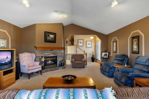 123 Valley Glen Bay Nw, Calgary, AB - Indoor Photo Showing Living Room With Fireplace