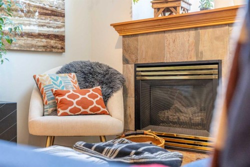 2-601 4Th Street, Canmore, AB - Indoor With Fireplace