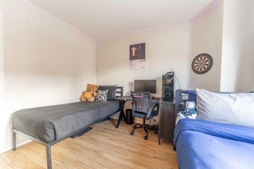2-601 4Th Street, Canmore, AB - Indoor Photo Showing Bedroom