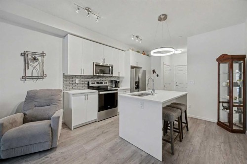 5105-151 Legacy Main Street Se, Calgary, AB - Indoor Photo Showing Kitchen With Stainless Steel Kitchen With Upgraded Kitchen