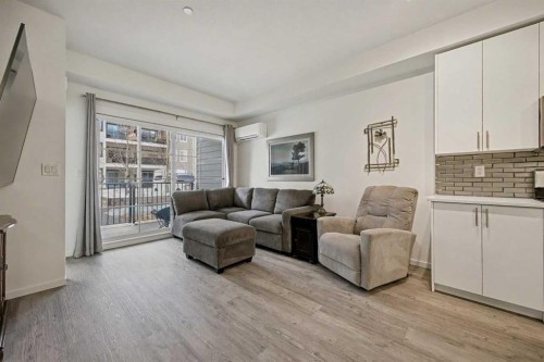 5105-151 Legacy Main Street Se, Calgary, AB - Indoor Photo Showing Living Room
