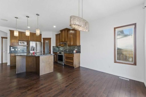 106 New Brighton Circle Se, Calgary, AB - Indoor Photo Showing Kitchen With Upgraded Kitchen