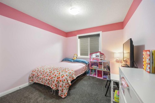 40 Evansfield Place Nw, Calgary, AB - Indoor Photo Showing Bedroom