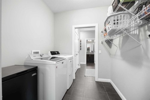 40 Evansfield Place Nw, Calgary, AB - Indoor Photo Showing Laundry Room