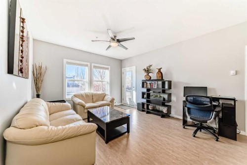 107-100 Cranfield Common Se, Calgary, AB - Indoor Photo Showing Living Room