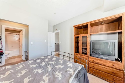 107-100 Cranfield Common Se, Calgary, AB - Indoor Photo Showing Bedroom