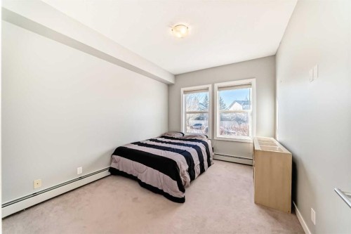 107-100 Cranfield Common Se, Calgary, AB - Indoor Photo Showing Bedroom