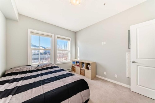 107-100 Cranfield Common Se, Calgary, AB - Indoor Photo Showing Bedroom