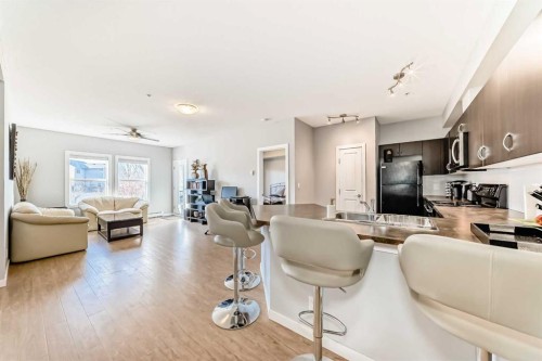 107-100 Cranfield Common Se, Calgary, AB - Indoor Photo Showing Living Room