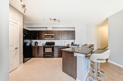 107-100 Cranfield Common Se, Calgary, AB - Indoor Photo Showing Kitchen