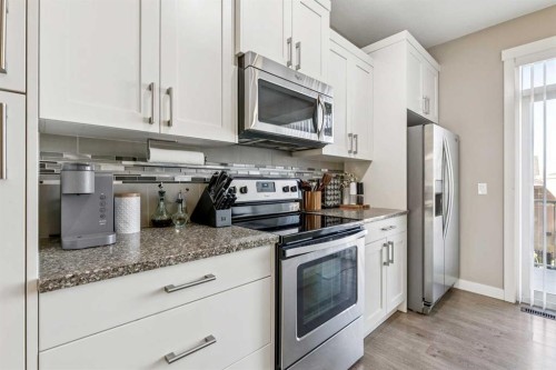 605 Evanston Manor Nw, Calgary, AB - Indoor Photo Showing Kitchen With Stainless Steel Kitchen With Upgraded Kitchen