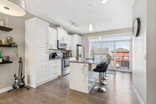 605 Evanston Manor Nw, Calgary, AB - Indoor Photo Showing Kitchen With Stainless Steel Kitchen