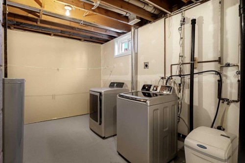 96 2 Street Se, High River, AB - Indoor Photo Showing Laundry Room