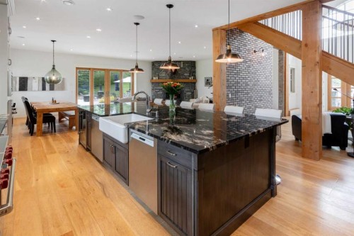 84 Eagle Butte Ranch, Rural Rocky View County, AB - Indoor Photo Showing Kitchen With Upgraded Kitchen