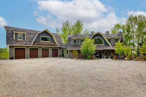 84 Eagle Butte Ranch, Rural Rocky View County, AB - Outdoor With Facade