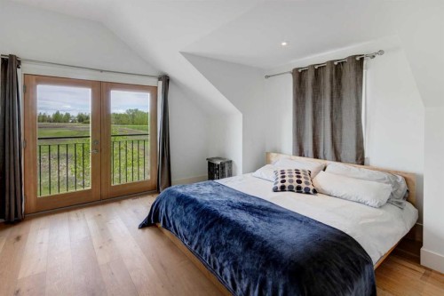 84 Eagle Butte Ranch, Rural Rocky View County, AB - Indoor Photo Showing Bedroom