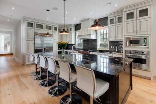 84 Eagle Butte Ranch, Rural Rocky View County, AB - Indoor Photo Showing Kitchen With Upgraded Kitchen