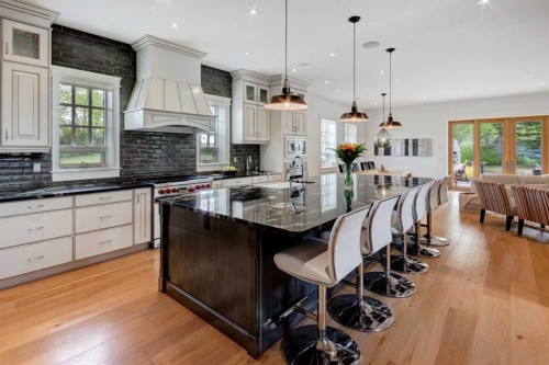 84 Eagle Butte Ranch, Rural Rocky View County, AB - Indoor Photo Showing Kitchen With Upgraded Kitchen