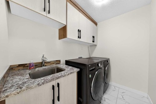 353 Nolanhurst Crescent Nw, Calgary, AB - Indoor Photo Showing Laundry Room