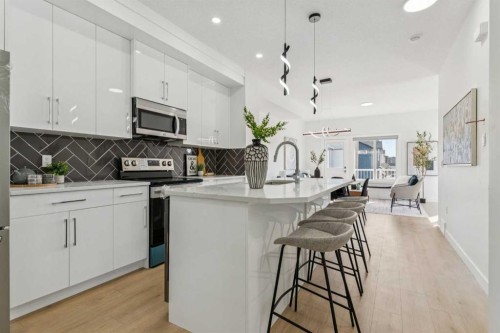 201-95 Saddlecrest Circle Ne, Calgary, AB - Indoor Photo Showing Kitchen With Upgraded Kitchen