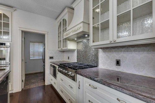 218 Valley Woods Place Nw, Calgary, AB - Indoor Photo Showing Kitchen With Upgraded Kitchen