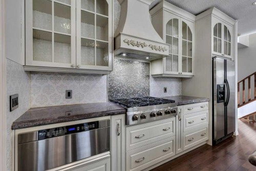 218 Valley Woods Place Nw, Calgary, AB - Indoor Photo Showing Kitchen With Upgraded Kitchen