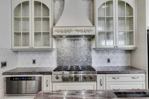 218 Valley Woods Place Nw, Calgary, AB - Indoor Photo Showing Kitchen With Upgraded Kitchen