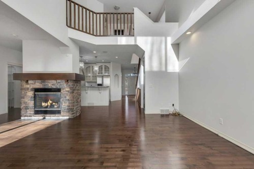218 Valley Woods Place Nw, Calgary, AB - Indoor With Fireplace