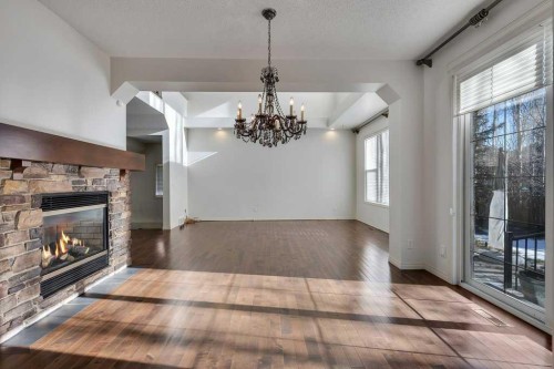 218 Valley Woods Place Nw, Calgary, AB - Indoor With Fireplace