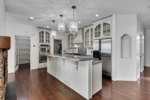 218 Valley Woods Place Nw, Calgary, AB - Indoor Photo Showing Kitchen With Upgraded Kitchen