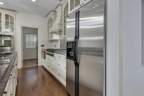218 Valley Woods Place Nw, Calgary, AB - Indoor Photo Showing Kitchen With Stainless Steel Kitchen With Upgraded Kitchen
