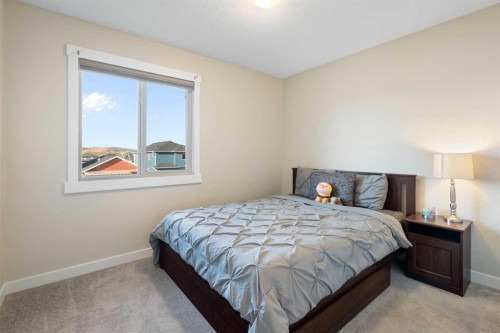 286 Fireside Place, Cochrane, AB - Indoor Photo Showing Bedroom