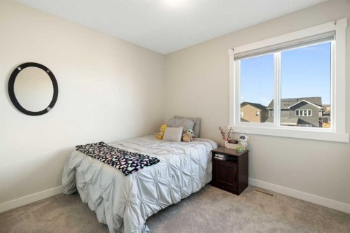 286 Fireside Place, Cochrane, AB - Indoor Photo Showing Bedroom