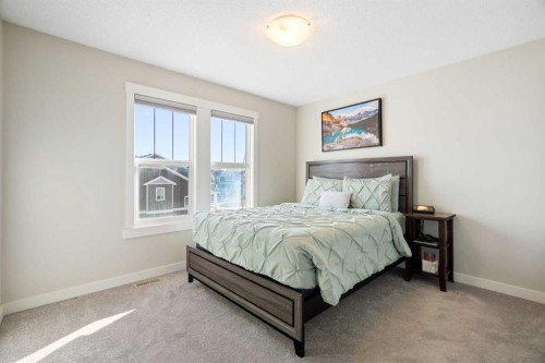 286 Fireside Place, Cochrane, AB - Indoor Photo Showing Bedroom