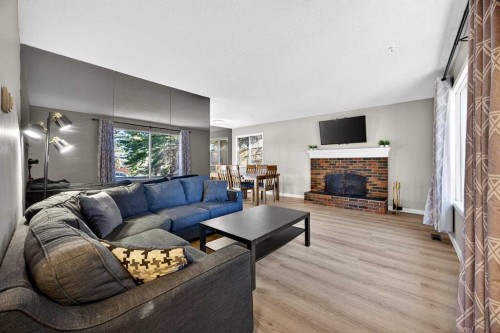 208 Silver Valley Rise Nw, Calgary, AB - Indoor Photo Showing Living Room With Fireplace