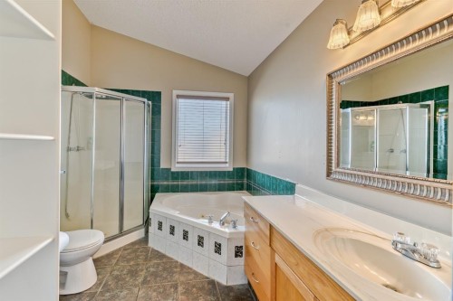 180 Hidden Vale Close Nw, Calgary, AB - Indoor Photo Showing Bathroom