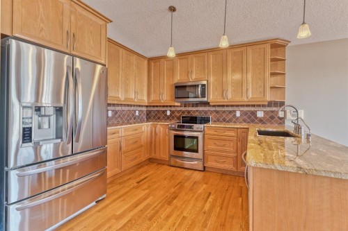 180 Hidden Vale Close Nw, Calgary, AB - Indoor Photo Showing Kitchen With Stainless Steel Kitchen