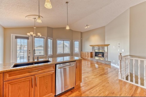 180 Hidden Vale Close Nw, Calgary, AB - Indoor With Fireplace