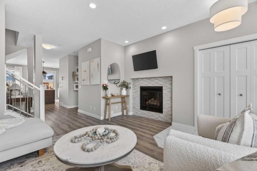 29 Howse Street Ne, Calgary, AB - Indoor Photo Showing Living Room With Fireplace