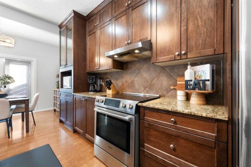 295 Prairie Springs Crescent Sw, Airdrie, AB - Indoor Photo Showing Kitchen With Stainless Steel Kitchen With Upgraded Kitchen