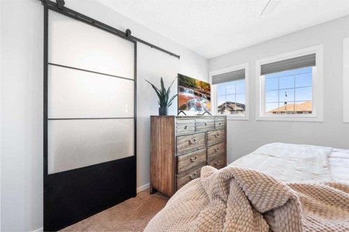 295 Prairie Springs Crescent Sw, Airdrie, AB - Indoor Photo Showing Bedroom