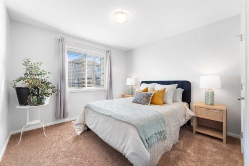 295 Prairie Springs Crescent Sw, Airdrie, AB - Indoor Photo Showing Bedroom