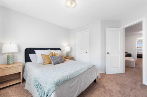 295 Prairie Springs Crescent Sw, Airdrie, AB - Indoor Photo Showing Bedroom